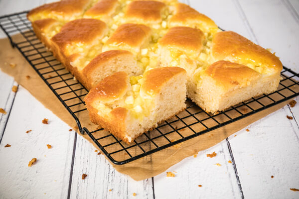 Winter Spiced Apple Traybake displayed on cooling rack